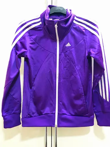 Adidas purple jacket for kids aged 11-12 for 70 aed.