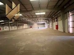 Large warehouse for rent in Al Sajaa with an area of 23,000 sq ft, 37.5 kW electricity, located on a
