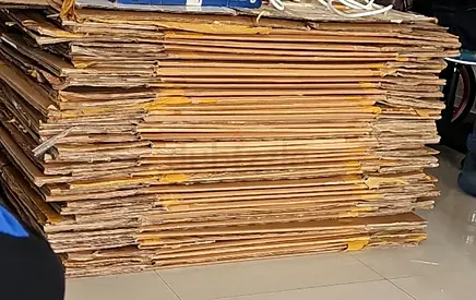 Stack of Flattened Cardboard Boxes — Bulk for Packing/Shipping