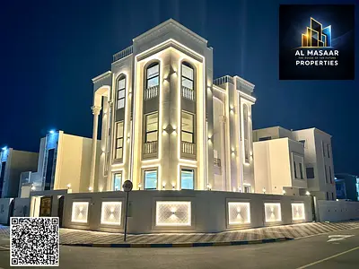 Luxury classic villa for sale in Al Zahia, corner location on two streets, with a luxurious design, including registration fees, electricity, water, a