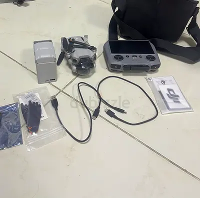 DJI Mini Series Drone with Controller, Extra Battery and Carry Bag - Good Condition