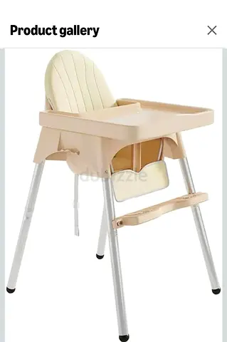 Simple beige baby high chair with removable tray