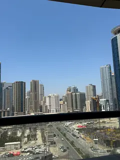 Two bedrooms and a living room in Sharjah, Al Khan, near Al Mamzar Lake, with free parking, 3 bathro