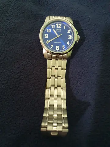 Casio Mens Stainless Steel Quartz Watch with Blue Dial needs battery