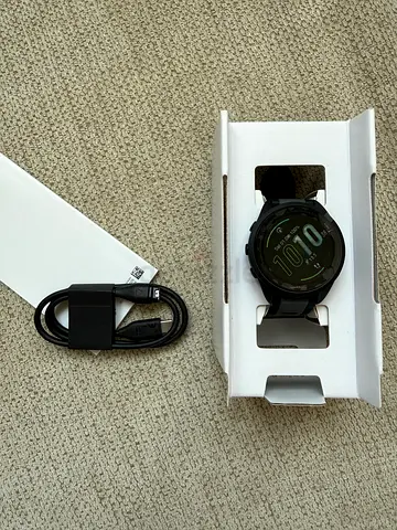 BRAND NEW garmin black GPS sports smartwatch with charging cable and box