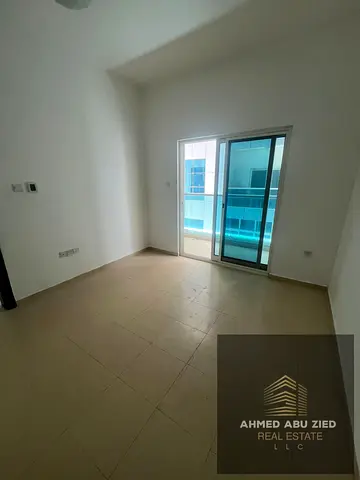 1BR apartment for annual rent in City Tower on Sheikh Khalifa Street, prime central location in Ajman, close to all services and facilities with easy