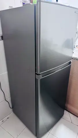 Used two-door refrigerator - good working condition