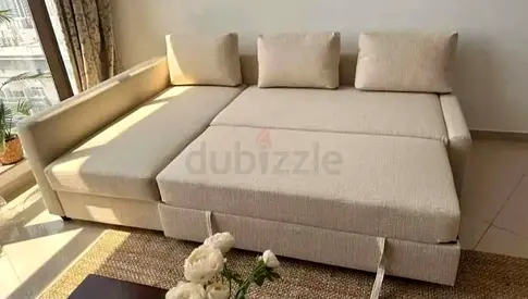 Beige L-Shaped Sofa Bed with Cushions - Comfortable Convertible