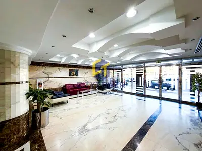 Bright and Large 2 Bedroom with Maid's Room Apartment with Gym / Pool Prime Location