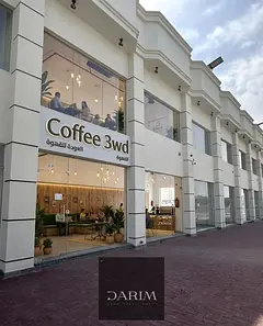 Prime commercial shops in Al Amrah Ajman, high-traffic area, front &amp; back units, strong investme