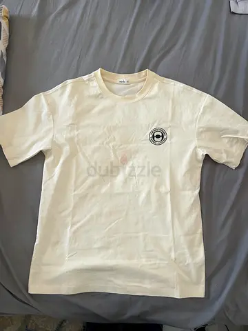off-white cotton T-shirt with small chest logo, size M