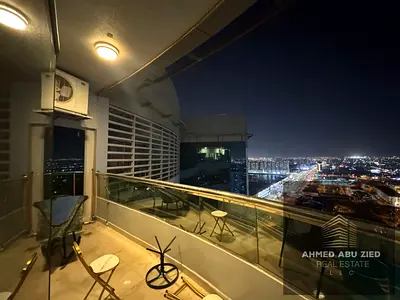 For annual rent: a two-bedroom apartment in Conquer Tower, directly on Khalifa Street. Prime locati