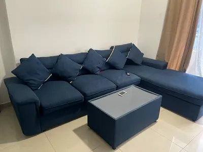Navy Blue L-Shaped Sofa with Ottoman - Good Condition