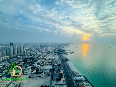 Two bedrooms and a living room with a sea view