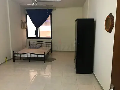 Spacious room available for rent in Abu Shagara for a working lady, with a separate bathroom