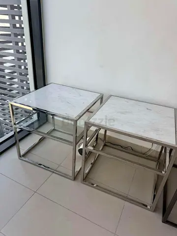 Marina homes stainless steel side tables with marble tops