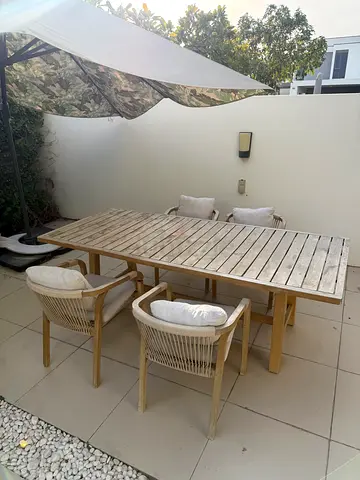 Outdoor wooden dining table with 4 matching chairs - good condition