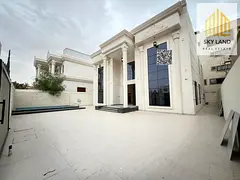 6 master bedrooms with a rooftop terrace, swimming pool, and internal elevator. The building area i