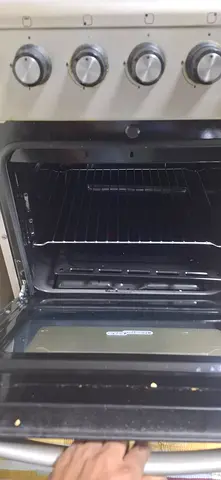 Stainless Steel Gas Oven with 4 Burners — Good Working Condition