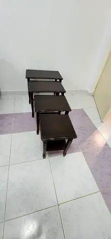 Set of 4 dark wood nesting side tables