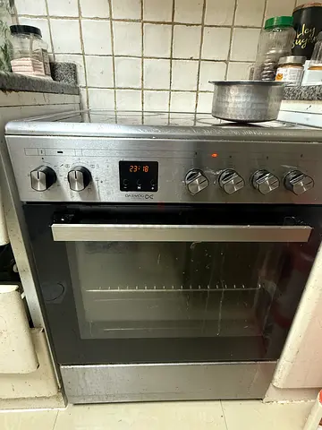 Used stainless steel electric oven with stovetop - good working condition