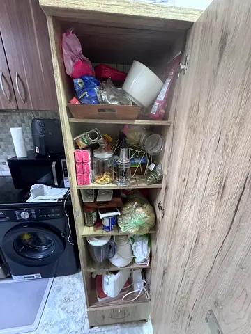 Light oak tall storage cabinet with open shelves — used, good condition