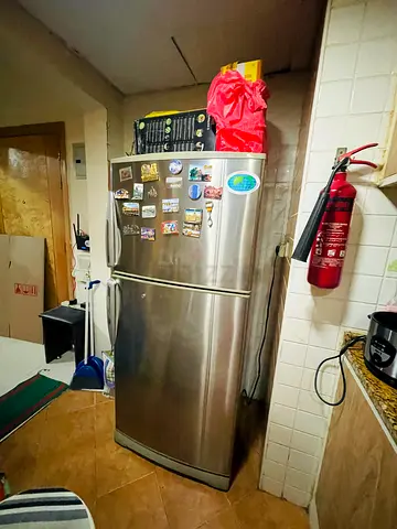 Used stainless steel double-door refrigerator (top freezer) - good condition