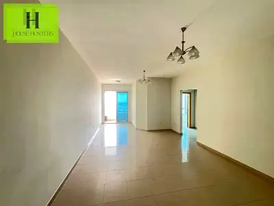 Spacious 1BR Balcony Wardrobe Al Taawun