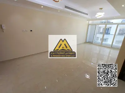 For annual rent: 3-bedroom apartment with a living room and balcony in Al Rawda 2, Ajman. Prime location on Sheikh Maktoum Bin Rashid Street with easy