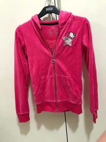Hello Kitty jacket for kids aged 10-11 for 55 aed.