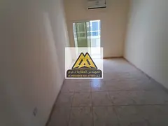 Two-bedroom apartment with a living room (2 balconies) for rent in Al Rawda 3, Ajman, directly on Sh