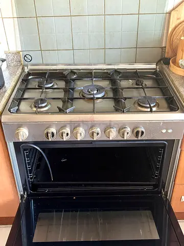 Used stainless steel 5-burner gas oven and stovetop - working condition