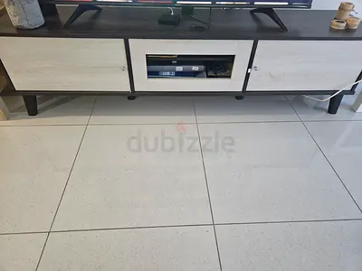 Modern low TV console / entertainment unit in light wood finish