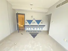 BRAND NEW BUILDING/1BHK CENTRAL AC WITH BALCONY 35K WITH PARKING, JUST IN ABU SHAGARA