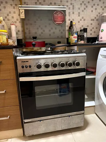 Used Stove + Oven with 4 burners - stainless finish