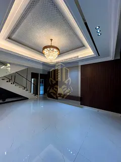 Luxury New Classic villa in Al Helio Center, 2 facades, street &amp; alley, G+1+roof, 6 master beds,