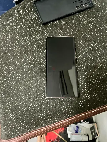 Samsung Galaxy smartphone in good working condition with case.