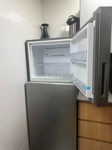 Used stainless steel top-freezer refrigerator - good condition