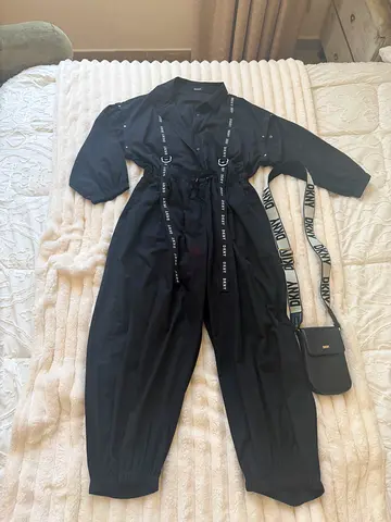 DKNY jumpsuit and purse
