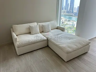 Marina Homes feather filled sofa with ottoman