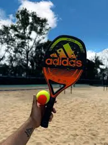 Beach paddle racket with ball - good condition