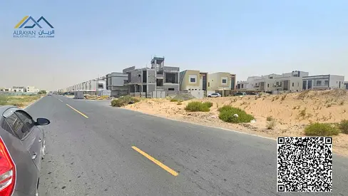 Commercial land on a corner lot with three street frontages, permit for ground floor and two additional floors.