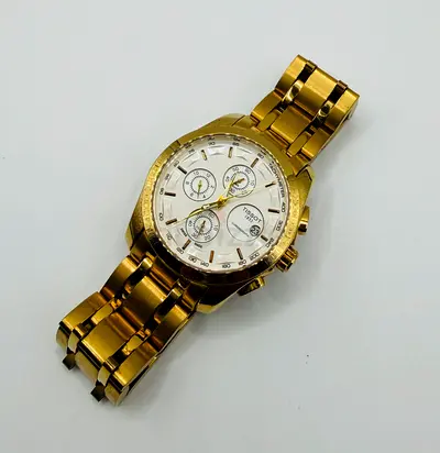 Tissot Couturier Gold Mens Watch - T035627A