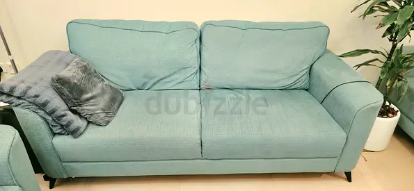 Comfortable 4-Seater Blue Sofa - Good Condition and Balcony table with 4 chairs.