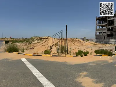 Prime corner commercial land for sale with permit (G+2) in Al Zahia – Ajman