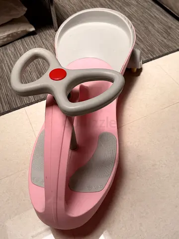 Pink toddler ride-on car / push scooter (good condition)