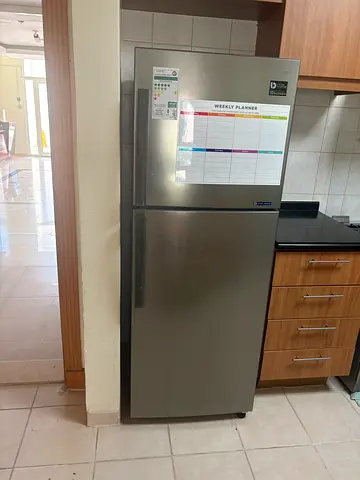 Used stainless steel refrigerator - bottom freezer, good condition