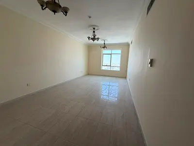 Luxurious full view of Al Wahda Street. 2-bedroom master apartment with living room, free central AC, open kitchen, excellent finishing, well-distrib