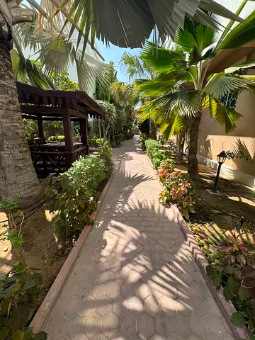 Luxury apartment for rent in Al Khan, Sharjah. Two bedrooms, two living rooms, three bathrooms, garden, children's play area, close to the Corniche, f