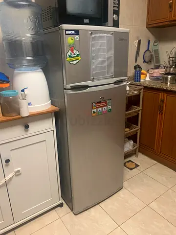 Silver single-door refrigerator in good working condition